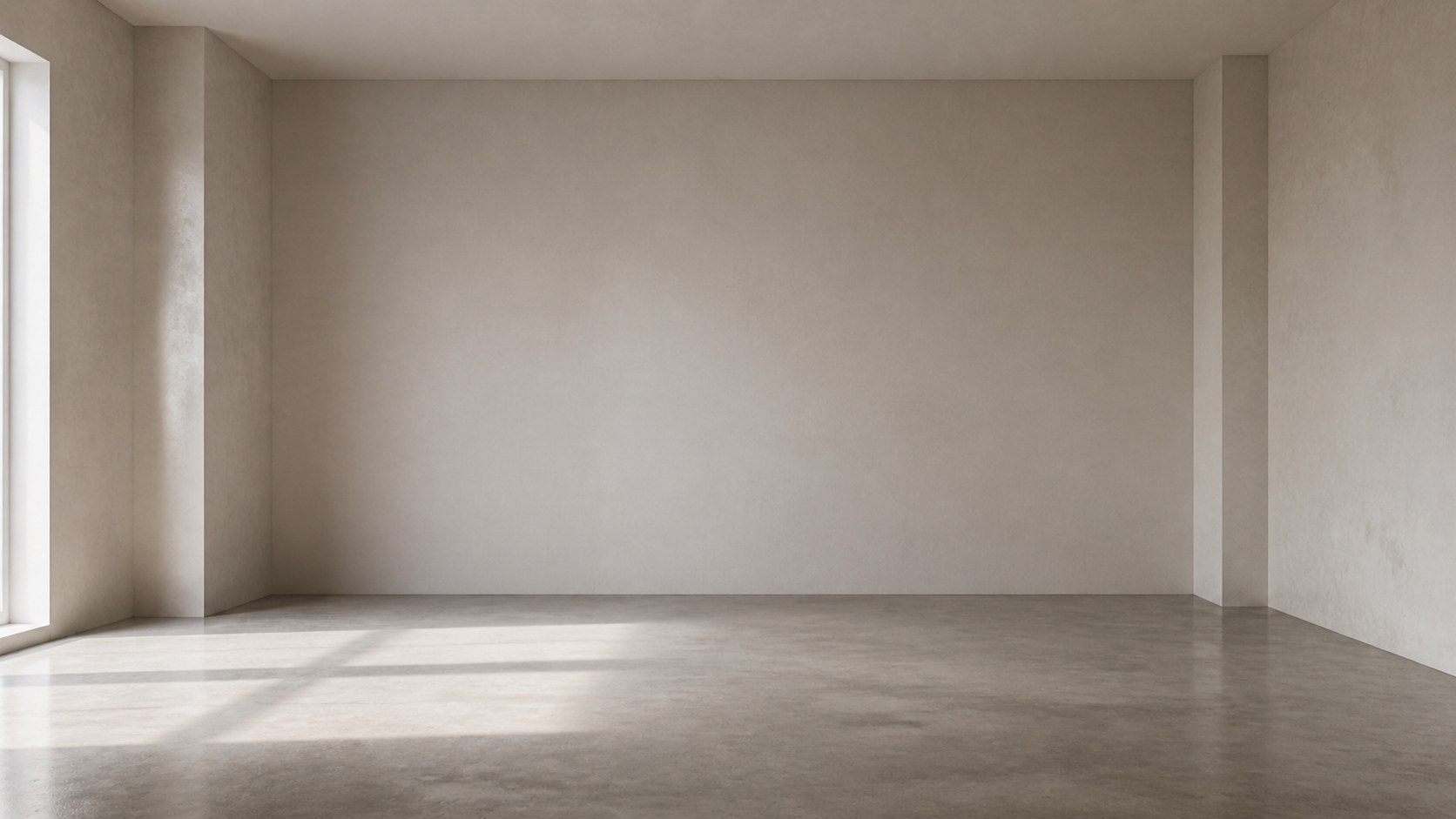 An empty pale room, daylight from the left