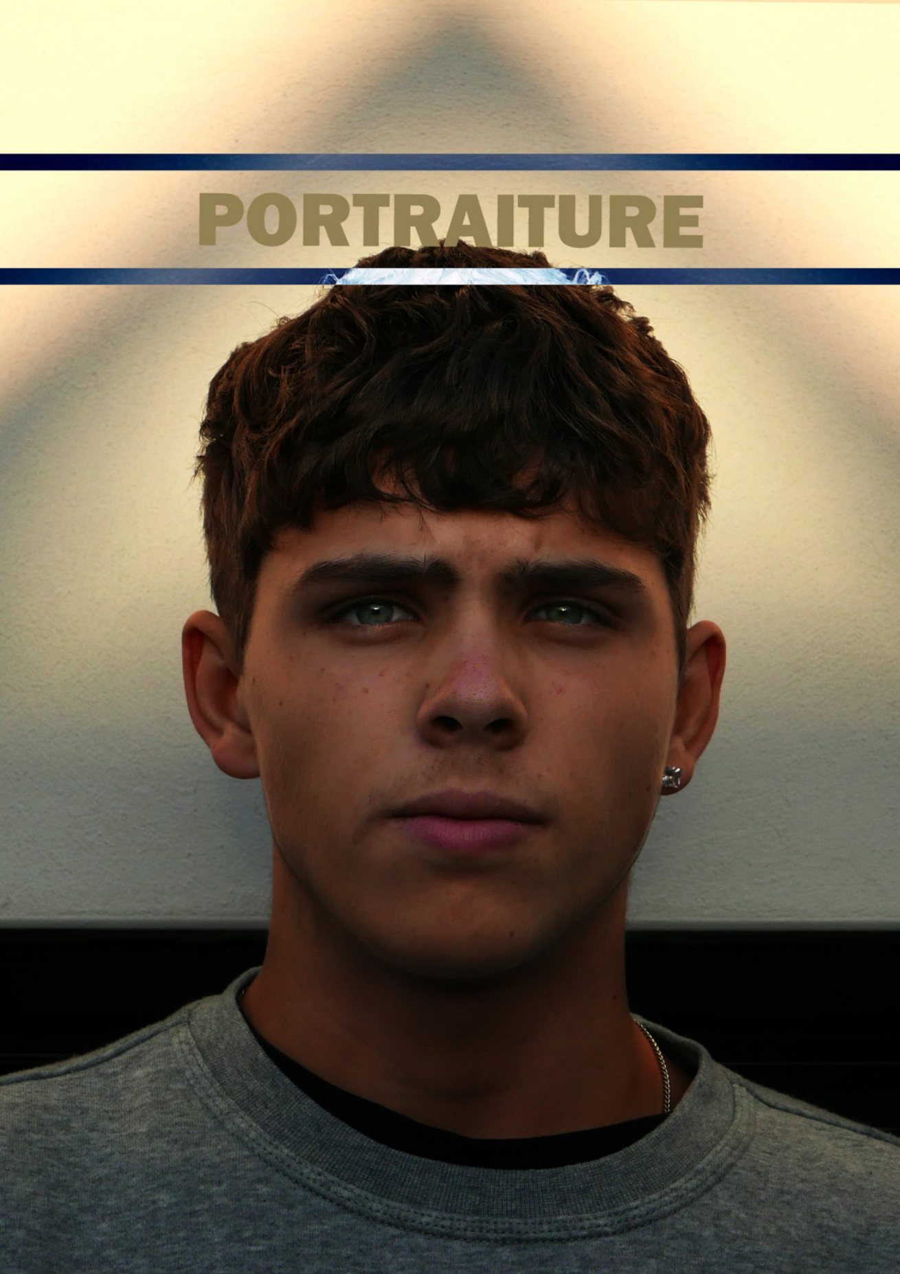 The cover of a magazine called Portraiture: a black and white portrait of a young man looking straight at the camera, masthead across the top