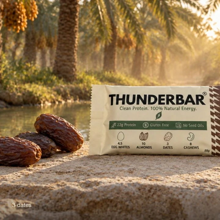 Carousel slide: the bar on stone with dates under palms