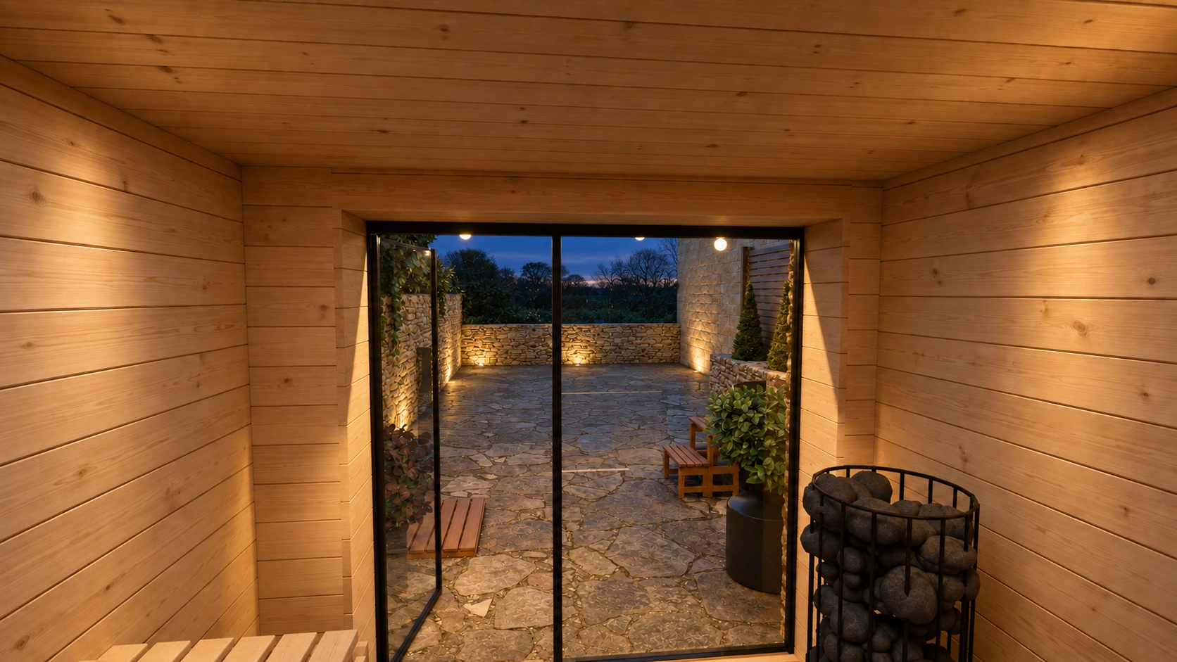 From inside the sauna looking out through the glass door across the yard at dusk.